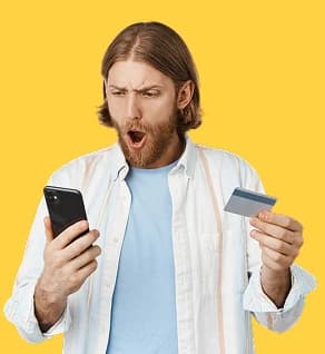 Person holding phone and credit card looking shocked — no written quote red flag