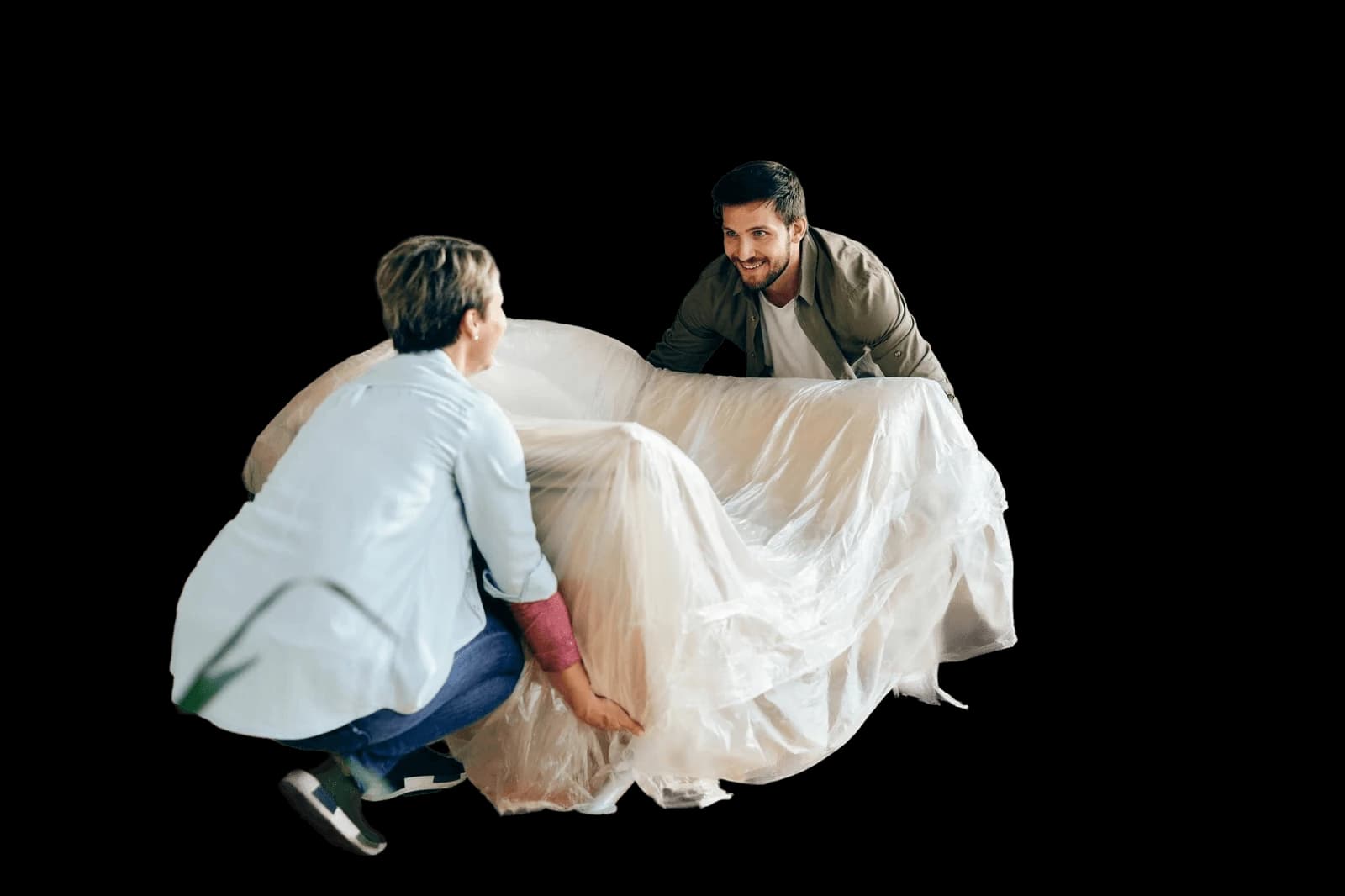 Two people carrying a sofa