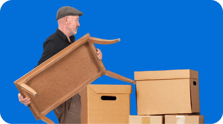 Giant Van crew delivering a dining table to a ground-floor UK home — no stair charge applies.