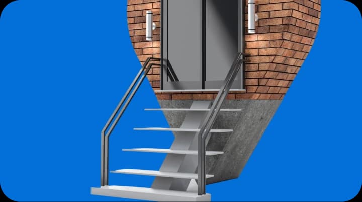 Giant Van two-person crew carrying a dining table upstairs in a UK flat with no lift access.