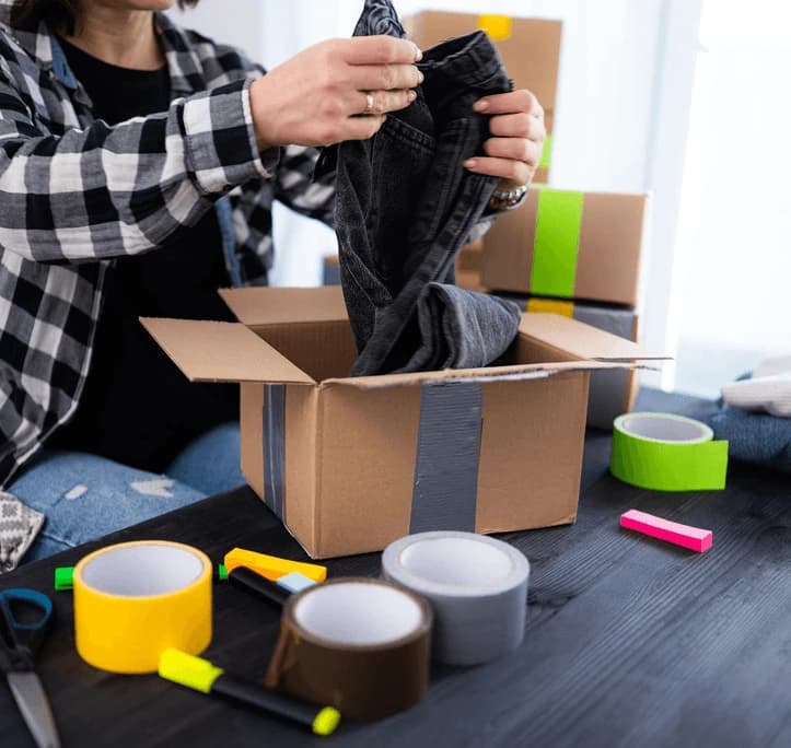 Packing boxes during the week before a studio flat move.