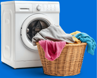 A washing machine and laundry basket ready for delivery