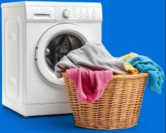 A washing machine and laundry basket ready for delivery