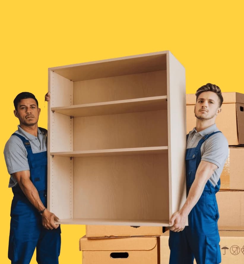 Giant Van team aligning a sliding wardrobe door during a wardrobe assembly service in a UK bedroom.