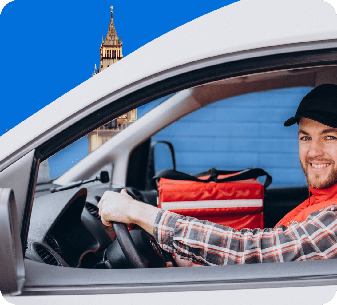 Trainee driver working alongside an experienced Giant Van driver on a live job