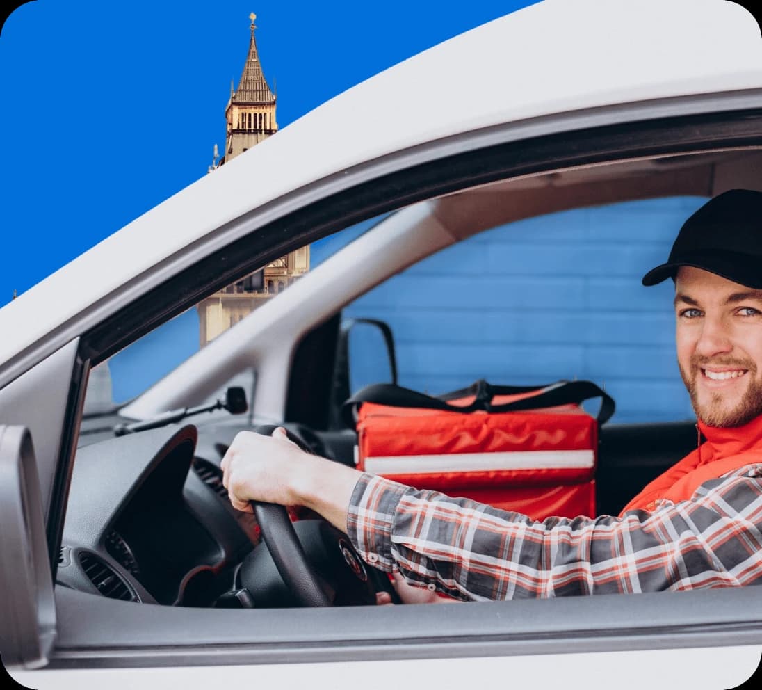Trainee driver working alongside an experienced Giant Van driver on a live job