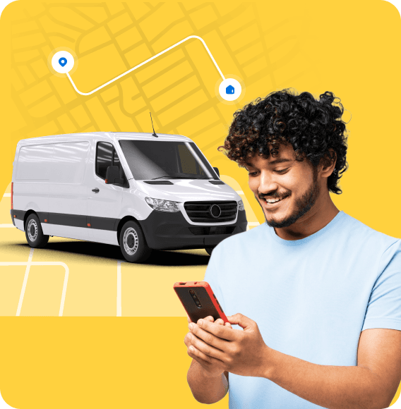 Two Giant Van drivers shaking hands beside a branded van with a route map