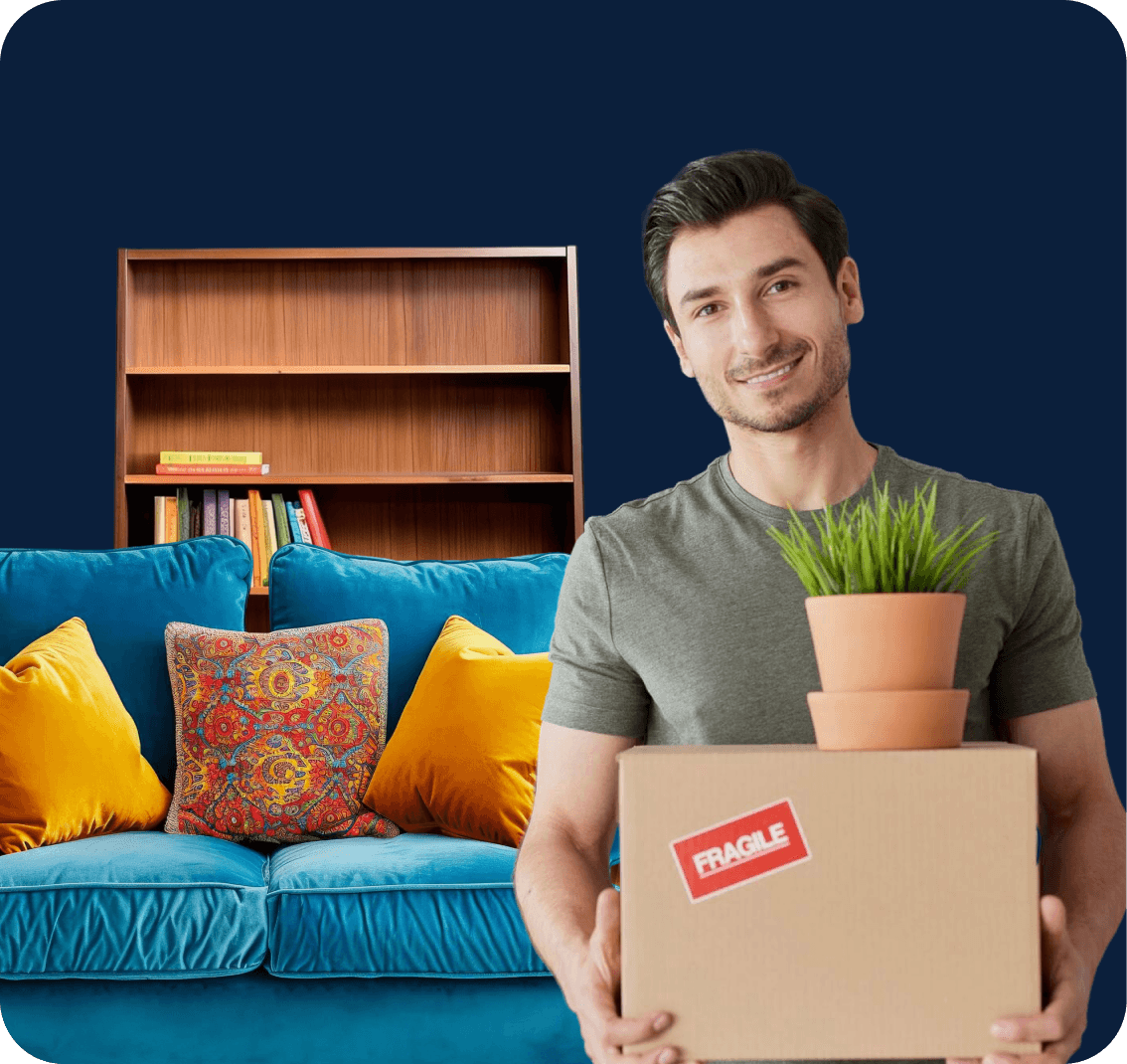 Giant Van team member carrying a packed moving box at a customer's home