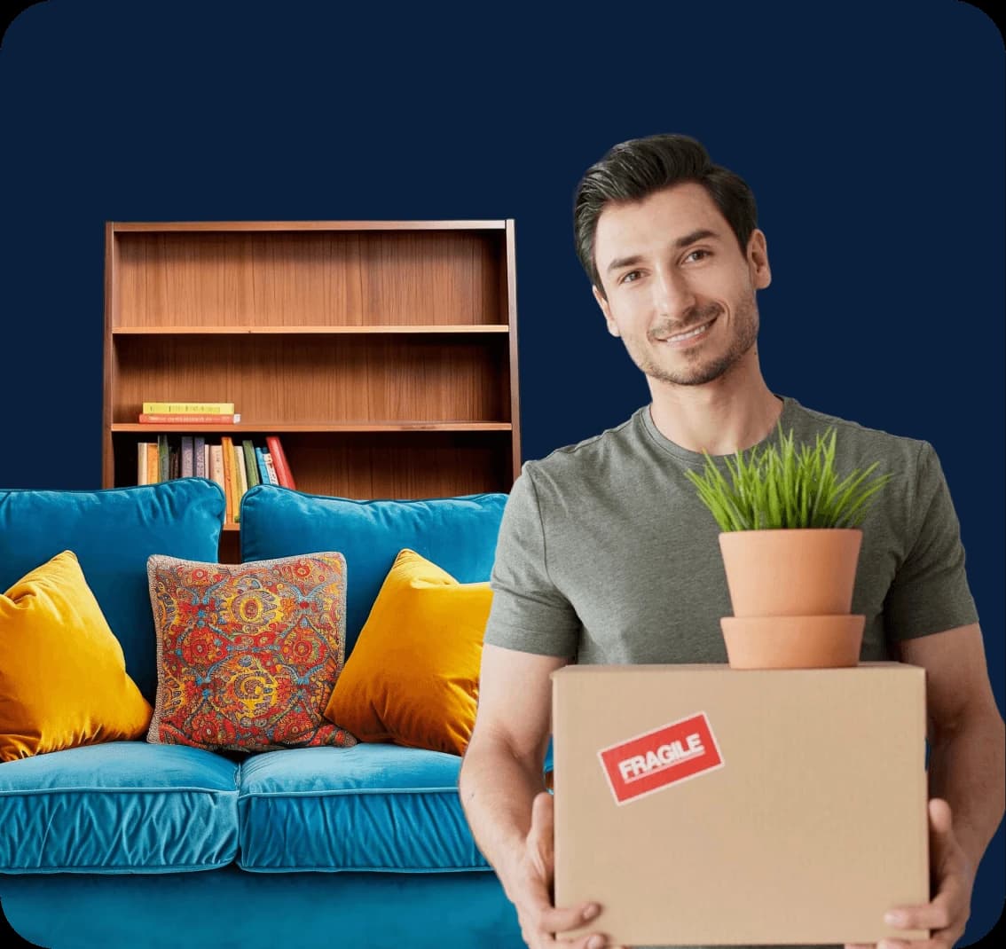 Giant Van team member carrying a packed moving box at a customer's home