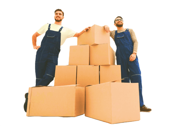 Two Giant Van crew members carrying boxes