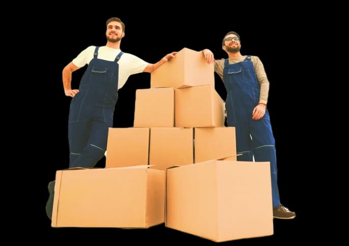 Two Giant Van crew members carrying boxes
