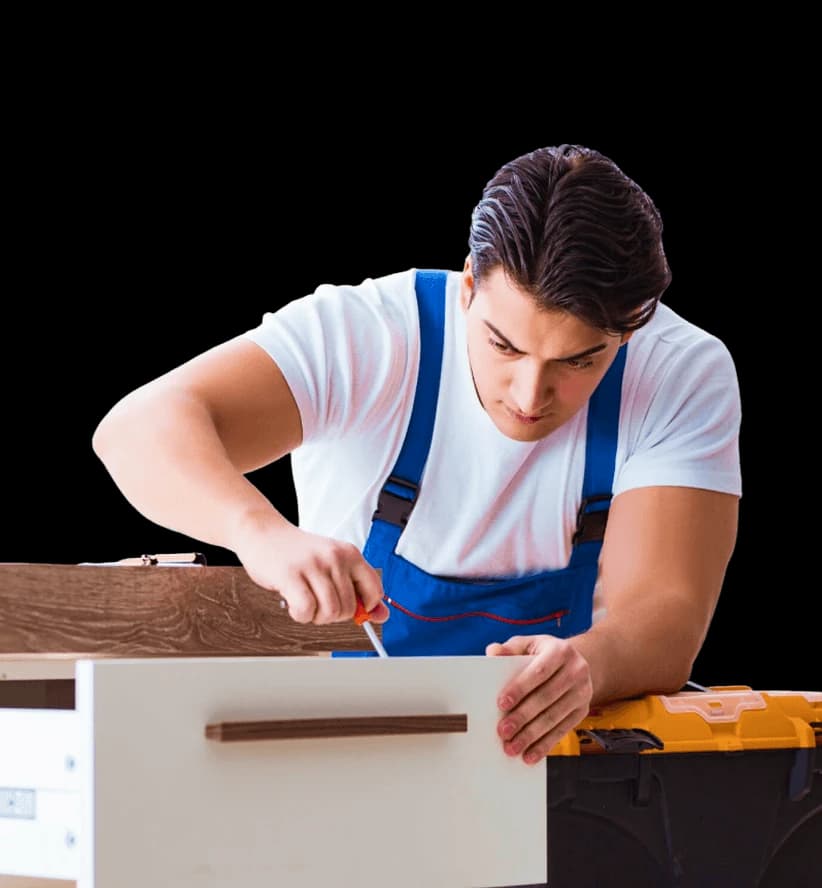 Mover preparing a Luton van load — wrapping and securing items for transport