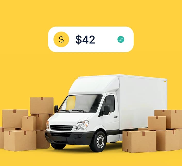 White Luton van with stacked cardboard boxes — Luton van hire prices and pricing models