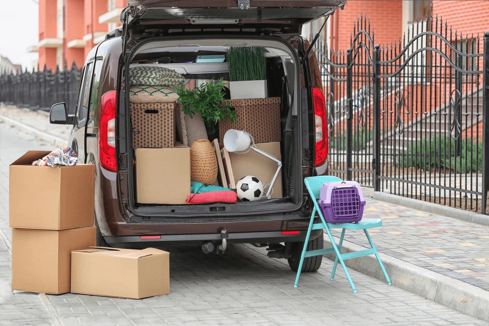 Giant Van porters with loading equipment ready to work