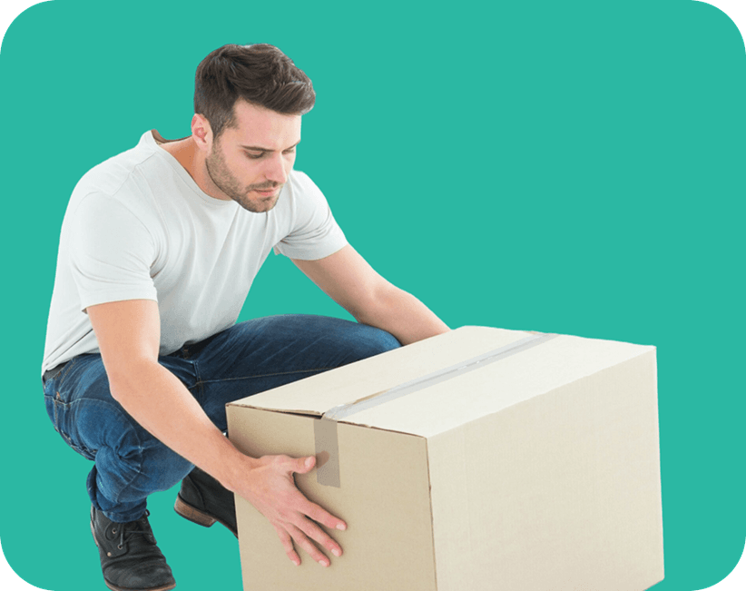 Giant Van professional packer carefully packing a removal box for a 2 bed house move.