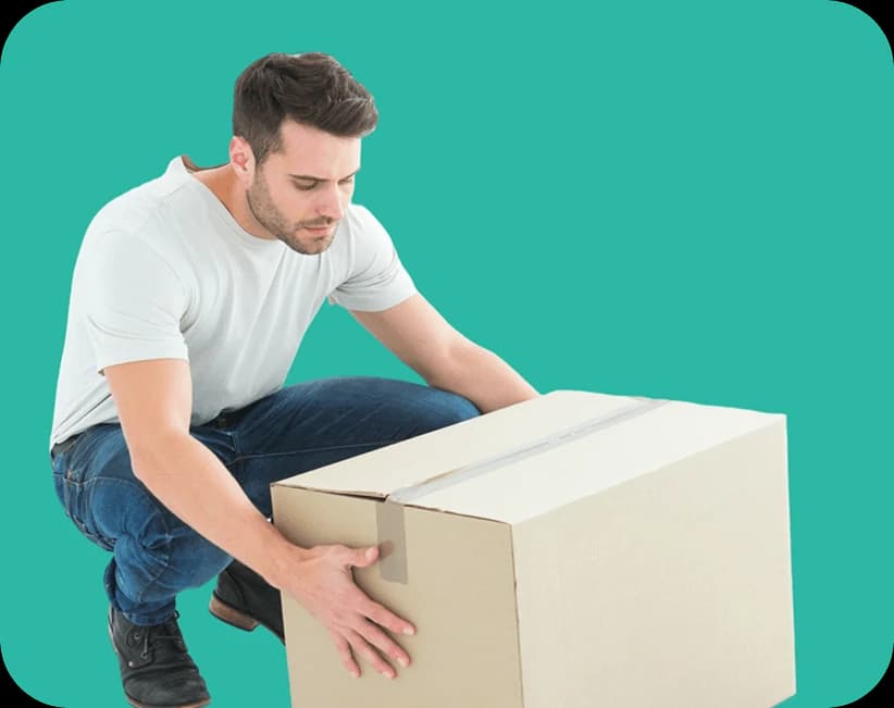 Giant Van professional packer carefully packing a removal box for a 2 bed house move.