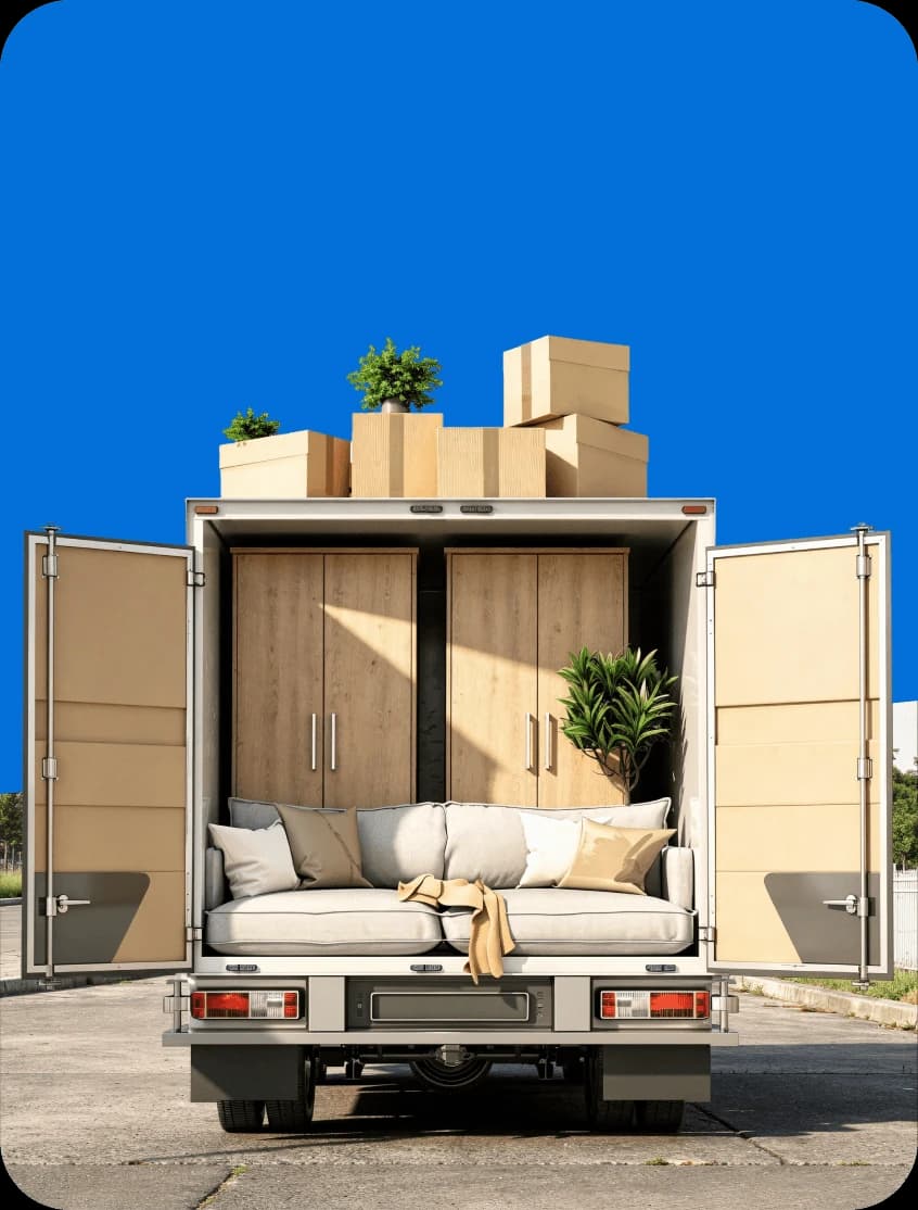 Giant Van crew navigating a wardrobe through a tight UK doorway during wardrobe delivery.